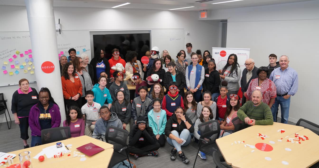 Group of students and adults posing for a group photo